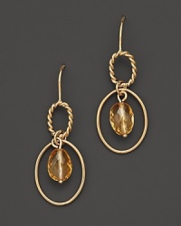 Faceted oval citrine adds rich sparkle to links of 14K yellow gold. Faceted oval citrine adds rich sparkle to links of 14K yellow gold.