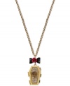 Think outside the box with this coffin pendant necklace from Betsey Johnson. Crafted from gold-tone mixed metal and featuring bow and flower details, as well as glass crystal accents, the necklace buries conventional notions of style. Approximate length: 35 inches + 3-inch extender. Approximate drop: 2-1/3 inches.