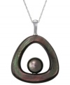 Center of attraction. This sterling silver necklace adds a sophisticated touch with a mother of pearl pendant enveloping a Tahitian pearl (11-12 mm) for an effect that's quite stunning. Approximate length: 18 inches. Approximate drop length: 1-3/4 inches.