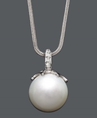 Highlight your neckline with a polished pearl and a hint of sparkle. A single cultured South Sea pearl (14 mm) hangs from a delicate 14k white gold chain and bail accented with sparkling diamonds. Approximate length: 18 inches. Approximate drop: 1 inch. Highlight your neckline with a polished pearl and a hint of sparkle. A single cultured South Sea pearl (14 mm) hangs from a delicate 14k white gold chain and bail accented with sparkling diamonds. Approximate length: 18 inches. Approximate drop: 1 inch.