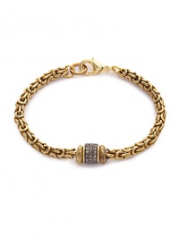THE LOOKLuxury CollectionIntricate antiqued 18k goldplated chain setting.08 tcw diamond rhodium-plated sterling silver accentLobster claspTHE MEASUREMENTLength, about 7ORIGINMade in USA THE LOOKLuxury CollectionIntricate antiqued 18k goldplated chain setting.08 tcw diamond rhodium-plated sterling silver accentLobster claspTHE MEASUREMENTLength, about 7ORIGINMade in USA
