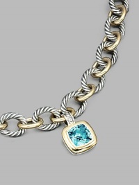 From the Albion Collection. A brilliant blue topaz, richly faceted, surrounded by 18k gold and set in sterling silver. Blue topaz 18k yellow gold and sterling silver About ½ square Hinged clip clasp Made in USA Please note: Necklace sold separately. From the Albion Collection. A brilliant blue topaz, richly faceted, surrounded by 18k gold and set in sterling silver. Blue topaz 18k yellow gold and sterling silver About ½ square Hinged clip clasp Made in USA Please note: Necklace sold separately.