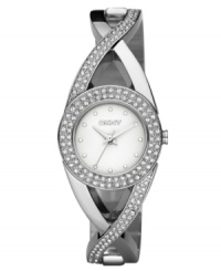 Celebrate a beautiful life with this stunning watch by DKNY. Crystal-accented stainless steel bracelet and round case. Crystal accents at bezel. Silvertone matte dial with tonal markers and logo. Quartz movement. Water resistant to 50 meters. Two-year limited warranty. Celebrate a beautiful life with this stunning watch by DKNY. Crystal-accented stainless steel bracelet and round case. Crystal accents at bezel. Silvertone matte dial with tonal markers and logo. Quartz movement. Water resistant to 50 meters. Two-year limited warranty.