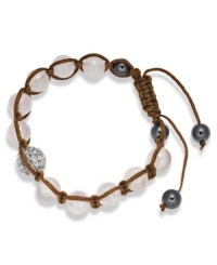 Spiritual-inspired bracelets are all the rage this season! Snap up this hot style from Ali Khan featuring semi-precious rose quartz beads and pave glass fireballs on a trendy brown cord. Bracelet adjusts to fit the wrist. Approximate diameter: 2 inches. Approximate length: 12-1/4 inches. Spiritual-inspired bracelets are all the rage this season! Snap up this hot style from Ali Khan featuring semi-precious rose quartz beads and pave glass fireballs on a trendy brown cord. Bracelet adjusts to fit the wrist. Approximate diameter: 2 inches. Approximate length: 12-1/4 inches.