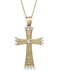 A versatile two tone cross pendant in design to last a lifetime. Crafted in 14k gold and 14k white gold, cross features an engraved scroll pattern and diamond-cut accents. Approximate length: 18 inches. Approximate drop width: 1 inch. Approximate drop length: 1-1/2 inches. A versatile two tone cross pendant in design to last a lifetime. Crafted in 14k gold and 14k white gold, cross features an engraved scroll pattern and diamond-cut accents. Approximate length: 18 inches. Approximate drop width: 1 inch. Approximate drop length: 1-1/2 inches.