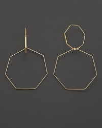 Interlocking hoops in 14K gold from Lana. Interlocking hoops in 14K gold from Lana.