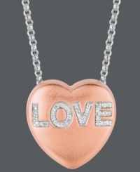 A little sparkle for your sweetheart. This diamond Sweethearts' Necklace shines as an expression of love. This dazzling pendant features a romantic heart shape, 14k rose gold over sterling silver setting, and round-cut diamond LOVE design (1/10 ct. t.w.). Copyright © 2011 New England Confectionery Company. Approximate length: 16 inches + 2-inch extender. Approximate drop: 5/8 inch. A little sparkle for your sweetheart. This diamond Sweethearts' Necklace shines as an expression of love. This dazzling pendant features a romantic heart shape, 14k rose gold over sterling silver setting, and round-cut diamond LOVE design (1/10 ct. t.w.). Copyright © 2011 New England Confectionery Company. Approximate length: 16 inches + 2-inch extender. Approximate drop: 5/8 inch.