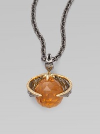 Wings of goldplated and black rhodium plated sterling silver, edged in pavé cubic zirconia, surrounds a topaz crystal, strung on a long elegant chain.Topaz crystal Cubic zirconia Goldplated sterling silver Black rhodium plated sterling silver Chain length, about 30 Pendant width, about 1½ Lobster clasp Imported Wings of goldplated and black rhodium plated sterling silver, edged in pavé cubic zirconia, surrounds a topaz crystal, strung on a long elegant chain.Topaz crystal Cubic zirconia Goldplated sterling silver Black rhodium plated sterling silver Chain length, about 30 Pendant width, about 1½ Lobster clasp Imported