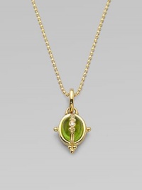 A smooth, peridot cabochon locket with three dazzling diamonds, all set in 18k gold. PeridotDiamonds, .025 tcw18k goldSize, about ¼Fixed baleMade in ItalyPlease note: Chain not included. A smooth, peridot cabochon locket with three dazzling diamonds, all set in 18k gold. PeridotDiamonds, .025 tcw18k goldSize, about ¼Fixed baleMade in ItalyPlease note: Chain not included.