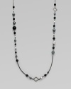 From the Quatrefoil Collection. An extra long sterling silver chain with bead and quatrefoil stations.Black onyx & hematite Sterling silver Can be worn doubled Length, about 48 Lobster clasp closure Imported 