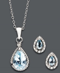 Rhapsody in blue. A lovely light blue hue defines the topaz stones (5-1/2 ct. t.w.) of this stylish earrings and pendant necklace set from Victoria Townsend. Crafted in sterling silver, they're sure to enhance any ensemble for day or evening. Approximate length (necklace): 18 inches. Approximate drop (pendant): 3/4 inch. Approximate diameter (earrings): 1/3 inch. Rhapsody in blue. A lovely light blue hue defines the topaz stones (5-1/2 ct. t.w.) of this stylish earrings and pendant necklace set from Victoria Townsend. Crafted in sterling silver, they're sure to enhance any ensemble for day or evening. Approximate length (necklace): 18 inches. Approximate drop (pendant): 3/4 inch. Approximate diameter (earrings): 1/3 inch.