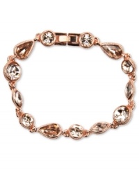 Ladylike sparkle. Givenchy's rose gold tone mixed metal flex bracelet features silk Swarovski stones. Approximate length: 7-1/2 inches. Approximate diameter: 2-1/2 inches. Ladylike sparkle. Givenchy's rose gold tone mixed metal flex bracelet features silk Swarovski stones. Approximate length: 7-1/2 inches. Approximate diameter: 2-1/2 inches.
