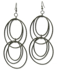 Ring in sophisticated style with GUESS. These multi-hoop earrings are crafted in hematite tone mixed metal with textured detail. Approximate drop: 4 inches. Approximate diameter: 1-3/4 inches. Ring in sophisticated style with GUESS. These multi-hoop earrings are crafted in hematite tone mixed metal with textured detail. Approximate drop: 4 inches. Approximate diameter: 1-3/4 inches.