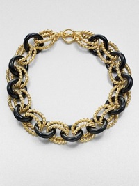 A graphic link style in 22k goldplating and glossy resin. Resin22k goldplatingLength, about 18Toggle closureMade in USA A graphic link style in 22k goldplating and glossy resin. Resin22k goldplatingLength, about 18Toggle closureMade in USA