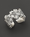 Delicate gardenias, captured at the height of their beauty in sterling silver, bloom on this ring from Buccellati.