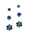 Sparkling style to match any ensemble. GUESS's fashionable three earring stud set features two round-cut studs and one pair of flower studs. Set crafted in silver tone mixed metal highlighting blue and blue zircon crystals. Approximate diameters: 7 mm, 5 mm, and 3-1/2 mm.