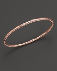 From the Rosé collection, skinny hammered bangle in rose gold. Designed by Ippolita. From the Rosé collection, skinny hammered bangle in rose gold. Designed by Ippolita.