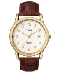 Take time in stride with this stylish watch by Timex. Brown croc-embossed leather strap and round goldtone mixed metal case. White dial with goldtone numerals, logo and date window. Analog movement. One-year limited warranty.
