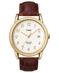 Take time in stride with this stylish watch by Timex. Brown croc-embossed leather strap and round goldtone mixed metal case. White dial with goldtone numerals, logo and date window. Analog movement. One-year limited warranty. Take time in stride with this stylish watch by Timex. Brown croc-embossed leather strap and round goldtone mixed metal case. White dial with goldtone numerals, logo and date window. Analog movement. One-year limited warranty.