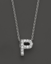 From the Tiny Treasures collection, a diamond P necklace. With signature ruby accent. Designed by Roberto Coin. From the Tiny Treasures collection, a diamond P necklace. With signature ruby accent. Designed by Roberto Coin.