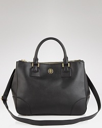 Perfectly proportioned in rich saffiano-finished leather. Tory Burch's classically styled tote defines obsession with it's polished yet day-right allure and essential-organizing compartments. Perfectly proportioned in rich saffiano-finished leather. Tory Burch's classically styled tote defines obsession with it's polished yet day-right allure and essential-organizing compartments.