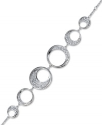 A modern and sophisticated interpretation of a timeless motif - the circle. Embellished with a touch of sparkling clear crystal pavé, Swarovski's fluid design complements a wide variety of outfits, making it very easy to wear. Crafted in rhodium-plated mixed metal. Approximate length: 6-1/2 inches. A modern and sophisticated interpretation of a timeless motif - the circle. Embellished with a touch of sparkling clear crystal pavé, Swarovski's fluid design complements a wide variety of outfits, making it very easy to wear. Crafted in rhodium-plated mixed metal. Approximate length: 6-1/2 inches.