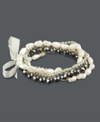 The simple luxuries create a stylish look. This chic five bracelet set stuns with sparkling hematite beads (121-1/2 ct. t.w.), white and grey cultured freshwater pearls (3-3/12 mm and 5-1/2-6 mm) and a sweet ribbon decor. Bracelets stretch to fit wrist. Approximate length: 7-1/2 inches. The simple luxuries create a stylish look. This chic five bracelet set stuns with sparkling hematite beads (121-1/2 ct. t.w.), white and grey cultured freshwater pearls (3-3/12 mm and 5-1/2-6 mm) and a sweet ribbon decor. Bracelets stretch to fit wrist. Approximate length: 7-1/2 inches.