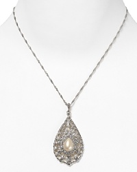 Vow to wow on your big day with this striking pearl and crystal teardrop pendant. It's an understated statement piece for the bride-to-be with classic aisle style. Vow to wow on your big day with this striking pearl and crystal teardrop pendant. It's an understated statement piece for the bride-to-be with classic aisle style.