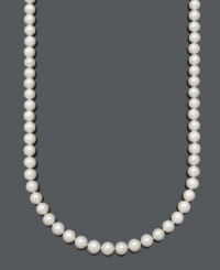 Channel the elegance and grace of style icon Audrey Hepburn. Beautiful Belle de Mer necklace features a long strand of AA cultured freshwater pearls (10-11 mm) with a 14k gold clasp. Approximate length: 30 inches. Channel the elegance and grace of style icon Audrey Hepburn. Beautiful Belle de Mer necklace features a long strand of AA cultured freshwater pearls (10-11 mm) with a 14k gold clasp. Approximate length: 30 inches.