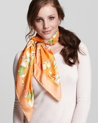 A vibrant silk scarf with large floral Ganini print all over from Salvatore Ferragamo. A vibrant silk scarf with large floral Ganini print all over from Salvatore Ferragamo.