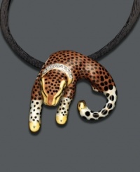 A sultry pendant with stealth and style, in 14k gold and sterling silver on an 18-inch black cord. Approximate drop: 1-1/4 inches. A sultry pendant with stealth and style, in 14k gold and sterling silver on an 18-inch black cord. Approximate drop: 1-1/4 inches.