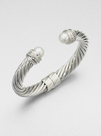 From the Pearl Crossover Collection. An iconic sterling silver cable accented with diamond and pearl end caps. Cultured pearlsDiamonds, .24 ctw Sterling silverDiameter, about 2.25Slip-on styleImported From the Pearl Crossover Collection. An iconic sterling silver cable accented with diamond and pearl end caps. Cultured pearlsDiamonds, .24 ctw Sterling silverDiameter, about 2.25Slip-on styleImported