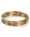 Give your look a shining finish with this gleaming set of gold plated bangles from Lauren Ralph Lauren.