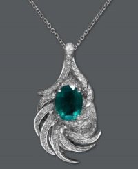 Get swept up in the glamour. Effy Collection's stunning leaf pendant features an oval-cut emerald (1-1/2 ct. t.w.) surrounded by sweeps of round-cut diamond (1/2 ct. t.w.). Setting and chain crafted in 14k white gold. From Brasilica by Effy. Approximate length: 18 inches. Approximate drop length: 1-1/4 inches. Approximate drop width: 2/3 inch. Get swept up in the glamour. Effy Collection's stunning leaf pendant features an oval-cut emerald (1-1/2 ct. t.w.) surrounded by sweeps of round-cut diamond (1/2 ct. t.w.). Setting and chain crafted in 14k white gold. From Brasilica by Effy. Approximate length: 18 inches. Approximate drop length: 1-1/4 inches. Approximate drop width: 2/3 inch.