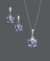 Bedeck yourself in a beautiful bouquet. Jewelry set features oval-cut tanzanite (2 ct. t.w.) and round-cut diamond accents in a floral pattern. Set in sterling silver. Approximate length: 18 inches. Approximate pendant drop: 3/4 inch. Approximate earring drop: 3/4 inch. Bedeck yourself in a beautiful bouquet. Jewelry set features oval-cut tanzanite (2 ct. t.w.) and round-cut diamond accents in a floral pattern. Set in sterling silver. Approximate length: 18 inches. Approximate pendant drop: 3/4 inch. Approximate earring drop: 3/4 inch.
