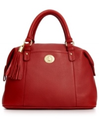 Preppy with posh appeal, this leather lovely from Tommy Hilfiger is poised to meet your daily demands. Crafted from soft, pebbled leather with signature detailing, its generous interior stows everything from eReader to opera tickets. Preppy with posh appeal, this leather lovely from Tommy Hilfiger is poised to meet your daily demands. Crafted from soft, pebbled leather with signature detailing, its generous interior stows everything from eReader to opera tickets.