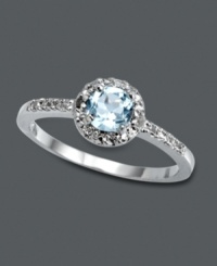 Subtle, simple, and sublime. This elegant Victoria Townsend style features a round-cut blue topaz gemstone (1/2 ct. t.w.) encircled by sparkling diamond accents. Crafted in sterling silver. Size 7. Subtle, simple, and sublime. This elegant Victoria Townsend style features a round-cut blue topaz gemstone (1/2 ct. t.w.) encircled by sparkling diamond accents. Crafted in sterling silver. Size 7.