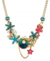 Enchantment under the sea, by Betsey Johnson. This frontal necklace combines gold tone mixed metal chains, crystal cup chain accents, blue oyster with glass pearl accent, turtle charm, turquoise starfish, pink lobster, pink and white fish, blue-colored crystal gems and pink starfish accent. Approximate length: 17 inches + 3-inch extender. Approximate drop: 2 inches.