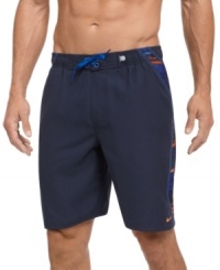 This sporty bathing suit from Nike upgrades your beach style. This sporty bathing suit from Nike upgrades your beach style.