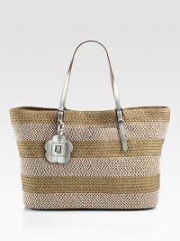 A packable style in a lovely woven design with metallic leather trim.Double leather top handles, 8½ dropTop zip and magnetic snap closureOne outside open pocketOne inside zip pocketOne inside open pocketPlastic/polyesterCotton lining19W X 12H X 7½DImported A packable style in a lovely woven design with metallic leather trim.Double leather top handles, 8½ dropTop zip and magnetic snap closureOne outside open pocketOne inside zip pocketOne inside open pocketPlastic/polyesterCotton lining19W X 12H X 7½DImported