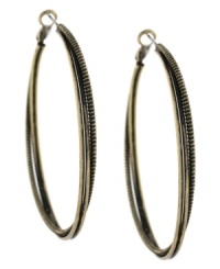 Add a stylish twist. The antique gold tone mixed metal setting on BCBGeneration's unique twisted hoop earrings give them a rustic look and feel. Approximate diameter: 2 inches. Add a stylish twist. The antique gold tone mixed metal setting on BCBGeneration's unique twisted hoop earrings give them a rustic look and feel. Approximate diameter: 2 inches.