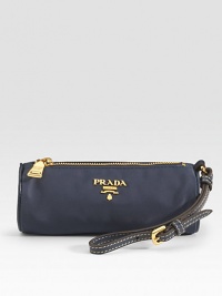 Classic roll shape with logo detail has a wristlet strap and a zipper closure. Wristlet strap, 5 drop Zipper closure Fully lined 6W X 2½H X 2½D Made in Italy Classic roll shape with logo detail has a wristlet strap and a zipper closure. Wristlet strap, 5 drop Zipper closure Fully lined 6W X 2½H X 2½D Made in Italy