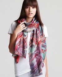 Red, purple and aqua run wild in a psychedelic, paint swirl print on this sheer cashmere and silk Bindya scarf. Red, purple and aqua run wild in a psychedelic, paint swirl print on this sheer cashmere and silk Bindya scarf.