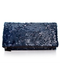 Shake up boring black evening attire with some sassy shimmer. Start with this sequin clutch from BCBGeneration that features a foldover design and plenty of interior pockets to stash your out-on-the-town essentials. Shake up boring black evening attire with some sassy shimmer. Start with this sequin clutch from BCBGeneration that features a foldover design and plenty of interior pockets to stash your out-on-the-town essentials.