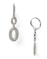 With shapely rhodium-plated links and crystal stations, these ornate drop earrings from Nadri are an eye-catching adornment that you'll wear now and treasure forever. With shapely rhodium-plated links and crystal stations, these ornate drop earrings from Nadri are an eye-catching adornment that you'll wear now and treasure forever.