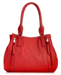 Highly functional and totally fabulous, this chic shopper from Tignanello is the ultimate daytime accessory. Soft leather is accented with shiny silvertone hardware, while the interior offers three separate compartments with plenty of pockets to keep you organized on-the-go. Highly functional and totally fabulous, this chic shopper from Tignanello is the ultimate daytime accessory. Soft leather is accented with shiny silvertone hardware, while the interior offers three separate compartments with plenty of pockets to keep you organized on-the-go.