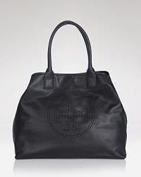 An ever-versatile leather Tory Burch tote is a fail safe daytime choice, detailed with a leather logo medallion. Its spacious lined interior features 3 pockets, secured by a top snap closure. An ever-versatile leather Tory Burch tote is a fail safe daytime choice, detailed with a leather logo medallion. Its spacious lined interior features 3 pockets, secured by a top snap closure.