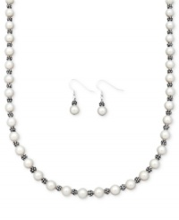 The perfect pairing for everlasting style. Every girl needs a cultured freshwater pearl (8-9 mm) and sterling silver necklace and earrings set in her collection. Approximate length: 18 inches. Approximate drop: 1-1/4 inches.