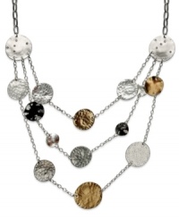 Drape your neckline in shimmering fashion. Alfani's currency-inspired necklace features three rows of circular pendants in silver, gold and hematite tones. Crafted in silver tone mixed metal. Approximate length: 19-1/2 inches + 3-inch extender. Approximate drop: 3 inches. Drape your neckline in shimmering fashion. Alfani's currency-inspired necklace features three rows of circular pendants in silver, gold and hematite tones. Crafted in silver tone mixed metal. Approximate length: 19-1/2 inches + 3-inch extender. Approximate drop: 3 inches.