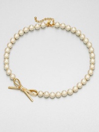 From the Skinny Mini Collection. A classic strand of lustrous faux pearls, sweetly accented with a sparkly bow.Faux pearlsRhinestonesGoldtoneLength, about 18Lobster claspImported From the Skinny Mini Collection. A classic strand of lustrous faux pearls, sweetly accented with a sparkly bow.Faux pearlsRhinestonesGoldtoneLength, about 18Lobster claspImported